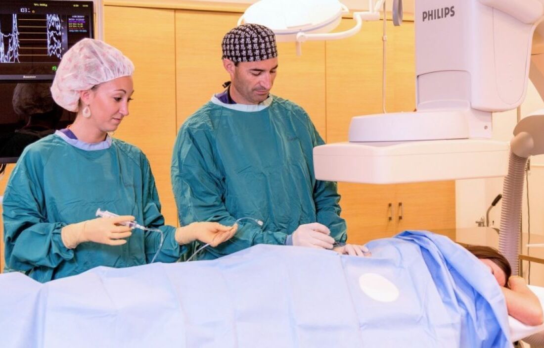 Doctors in operating room with patient